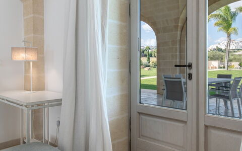Villa Bellavista: Plant, Wood, Door, Lighting, Shade, Architecture, Interior Design, Tree, Floor