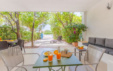 Villa Talise: Table, Furniture, Property, Building, Plant, Chair, Flowerpot, Tree, Shade, Couch