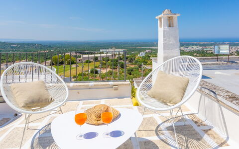 Romeo e Giulietta - Terrazza Vista Mare: Sky, Table, Furniture, Tableware, Product, Chair, Azure, Outdoor Furniture, Interior Design, Building