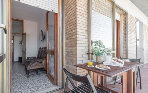 Cattolica Sea Loft: Furniture, Table, Flowerpot, Window, Wood, Houseplant, Building, Interior Design, Chair, Door
