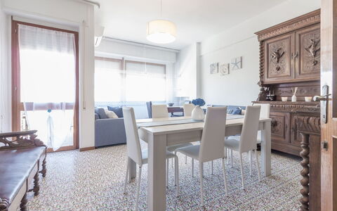 Cattolica Sea Loft: Table, Furniture, Building, Chair, Window, Wood, Picture Frame, Living Room, House, Interior Design