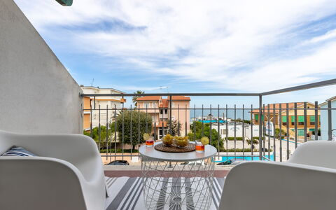 Conero Suite: Sky, Cloud, Building, Chair, Shade, Interior Design, Condominium, Urban Design, Table, Seaside Resort