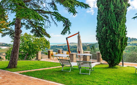 Villa Vagnini: Sky, Cloud, Plant, Daytime, Property, Furniture, Nature, Green, Natural Landscape, Table