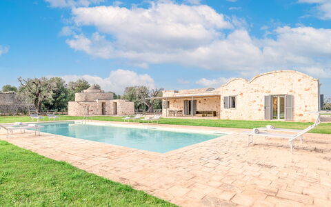 Villa Trullina: Cloud, Water, Sky, Plant, Building, Swimming Pool, Land Lot, Grass, Tree, Residential Area