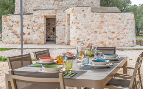 Villa Trullina: Table, Tableware, Furniture, Plant, Chair, Outdoor Table, Outdoor Furniture, Tree, Interior Design, Wood