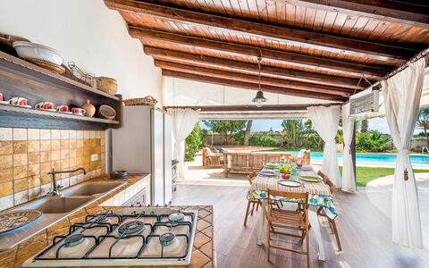 Villa Rossana: Table, Property, Plant, Building, Interior Design, Wood, Architecture, Chair, Floor, Shade