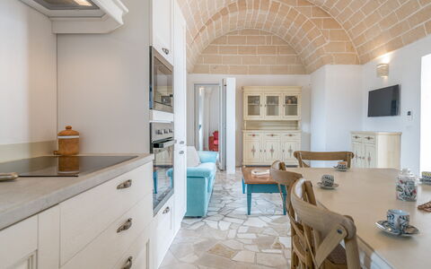 Bianco Trullo: Furniture, Cabinetry, Property, Chair, Kitchen, Wood, Table, Countertop, Flooring, Architecture