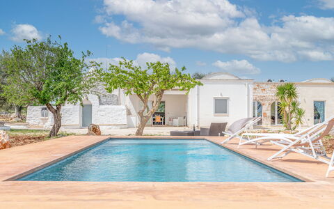 Bianco Trullo: Cloud, Water, Sky, Property, Swimming Pool, Plant, Azure, Building, Shade, Tree