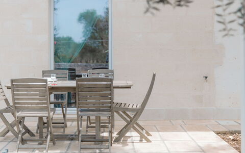Bianco Trullo: Furniture, Building, Table, Wood, Plant, Outdoor Furniture, Chair, Floor, Flooring, Tree