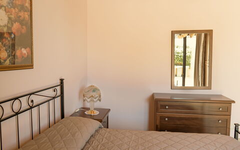Villa Saponara: Bed, Furniture, Bedroom, Bedding, Interior Design, Bed Sheet, Wood, Floor, Flooring, Room