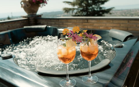 Etna Suites: Bottle, Drinkware, Glass Bottle, Swimming Pool, Barware, Food, Chair