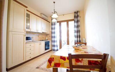 Suite Monolocale 2: Cabinetry, Furniture, Window, Building, Countertop, Wood, Table, Interior Design, Drawer, Kitchen