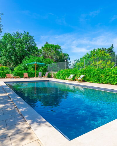 Sunrise Hill Holiday Home: Water, Plant, Sky, Property, Swimming Pool, Azure, Tree, Cloud, Condominium, Leisure