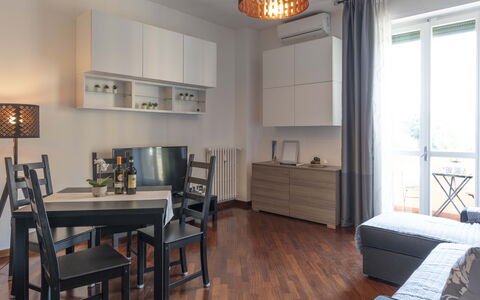 Novoli Suite Apartment: Table, Furniture, Cabinetry, Property, Window, Picture Frame, Wood, Chair, Living Room, Lighting