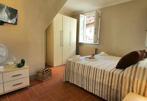 Loft Lucca: Furniture, Property, Cabinetry, Window, Comfort, Wood, Interior Design, Drawer, Bed Frame, Building