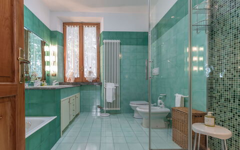 Villa Rosso Corbezzolo: Property, Sink, Plumbing Fixture, Azure, Building, Mirror, Cabinetry, Bathroom, Purple, Interior Design