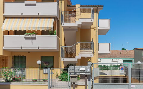 Fano Lighthouse: Building, Plant, Window, Sky, Urban Design, House, Land Lot, Condominium, Wood, Neighbourhood