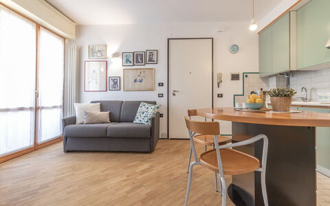 Fano Lighthouse: Furniture, Property, Couch, Table, Wood, Picture Frame, Interior Design, Flooring, Living Room, Floor