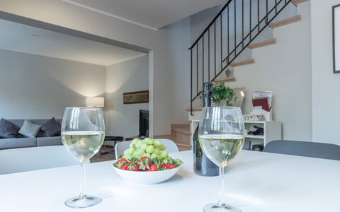 Casa Del Porto: Table, Tableware, Furniture, Food, Property, Stemware, Drinkware, Dishware, Wine Glass, Textile