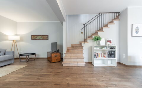 Casa Del Porto: Furniture, Interior Design, Wood, Lighting, Hall, Flooring, Picture Frame, Comfort, Living Room, Couch