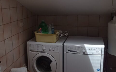 L'attico Di Castelfidardo: Laundry Room, Washing Machine, Clothes Dryer, Bathroom, Laundry, Floor, Home Appliance, Flooring, Material Property