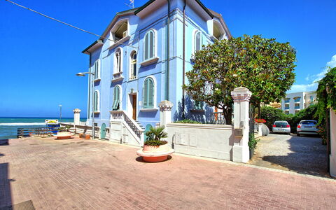 Casa Riva: Sky, Plant, Property, Building, Water, Window, Tree, Residential Area, Real Estate, Facade