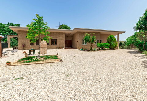Villa Elpidio: Building, Sky, Plant, Tree, House, Land Lot, Shade, Vegetation, Window, Landscape