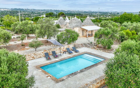 Trullo Ulivo: Water, Sky, Plant, Property, Cloud, Building, Swimming Pool, Azure, Nature, Tree