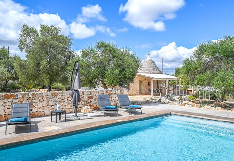 Trullo Ulivo: Water, Cloud, Plant, Sky, Property, Furniture, Swimming Pool, Blue, Azure, Tree