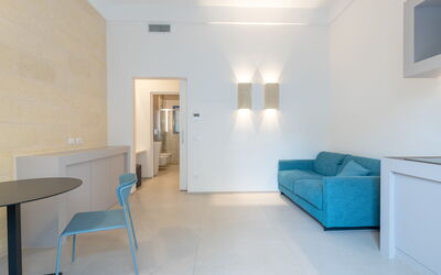 Appartamento ai Pescatori - la Nassa: Furniture, Table, Comfort, Building, Architecture, Interior Design, Couch, Flooring, Floor, Living Room
