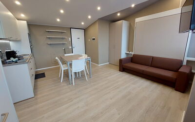Pavia Tower 7: Building, Wood, Comfort, Living Room, Floor, Flooring, House, Hall, Table, Couch