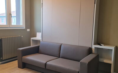 Pavia Tower 8: Couch, Window, Wood, Comfort, Flooring, Building, Floor, Living Room, Rectangle