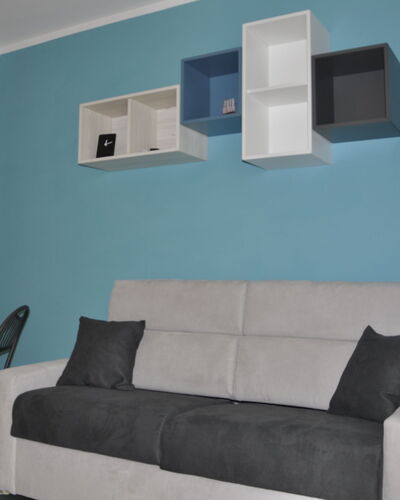 La Casara a: Property, Furniture, Picture Frame, Couch, Azure, Rectangle, Interior Design, Wood, Architecture, Comfort