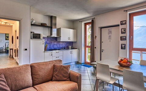 Bellano 16: Picture Frame, Furniture, Couch, Window, Blue, Table, Interior Design, Lighting, Wood, Living Room