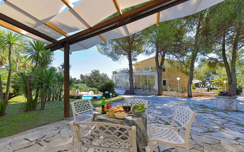 Villa Sole Martina Franca: Plant, Shade, Building, Sky, Tree, Outdoor Furniture, Leisure, Residential Area, Cottage, Landscape