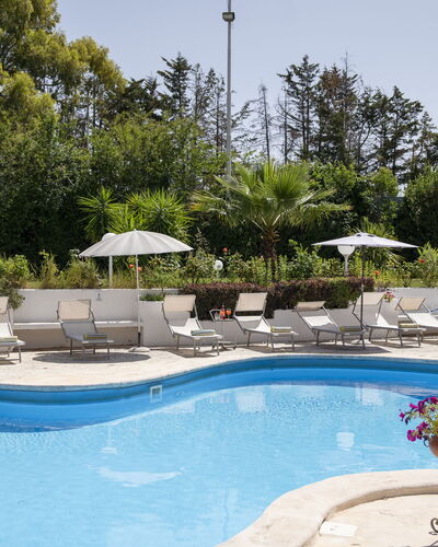 Villa Sole Martina Franca: Swimming Pool, Outdoor Furniture, Furniture, Umbrella, Resort, Sunlounger, Chair, Eco Hotel, Leisure, Shade