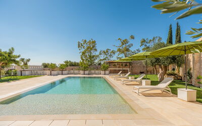 Mastropà Exclusive Resort: Water, Plant, Sky, Property, Swimming Pool, Azure, Tree, Arecales, Leisure, Shade