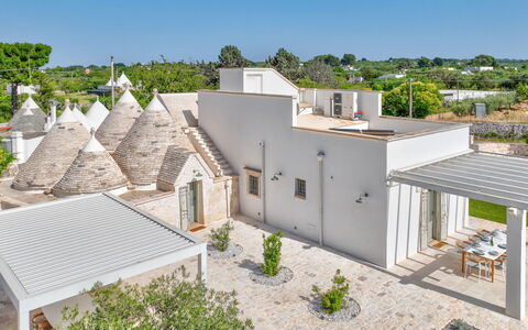 Trullo Under The Apulian Sky: Plant, Sky, Building, Property, Window, Tree, House, Land Lot, Urban Design