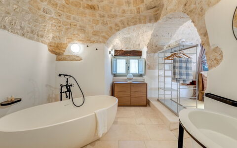 Trullo Under The Apulian Sky: Bathtub, Plumbing Fixture, Tap, Mirror, Sink, Bathroom, Wood, Window, Interior Design, Floor