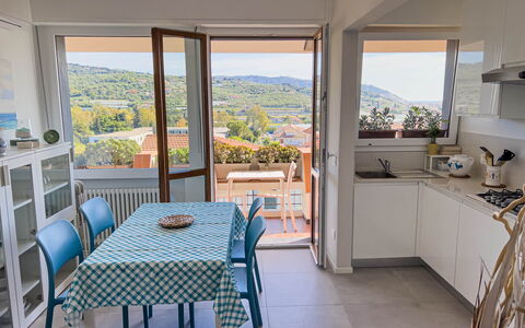 Appartamento La Castellana: Furniture, Property, Chair, Table, Cabinetry, Azure, Countertop, Interior Design, Shade, Wood