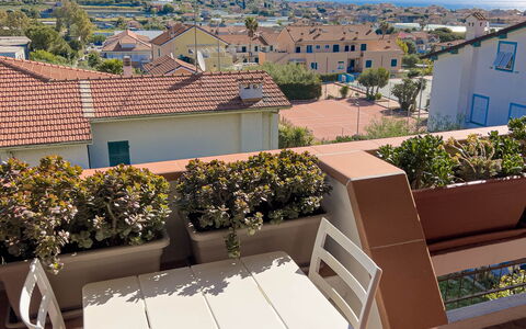 Appartamento La Castellana: Sky, Plant, Property, Building, Cloud, Shade, Outdoor Furniture, Architecture, Interior Design, Table