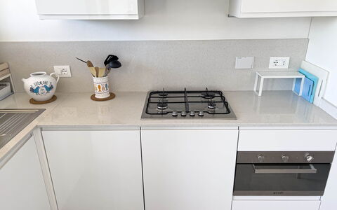 Appartamento La Castellana: Cabinetry, Countertop, Property, Furniture, Kitchen Stove, Kitchen Appliance, Kitchen, Home Appliance, Cooktop, Interior Design