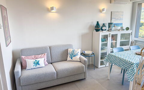 Appartamento La Castellana: Furniture, Property, Couch, Blue, Azure, Interior Design, Floor, Flooring, Living Room