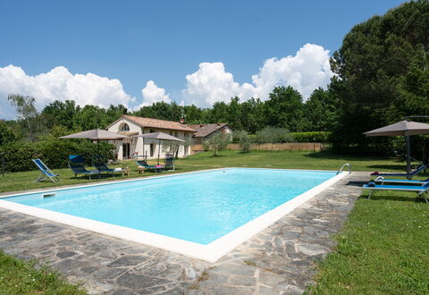 Villa Le Selve: Cloud, Water, Sky, Plant, Property, Swimming Pool, Shade, Tree, Building, Grass