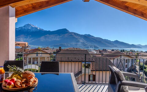Martino: Sky, Property, Daytime, Building, Water, Azure, Wood, Shade, Mountain, Lighting