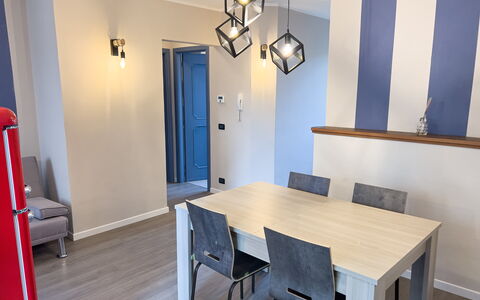 Apartment Tre - Diano Marina: Table, Property, Furniture, Chair, Wood, Interior Design, Floor, Flooring, Hardwood, Wood Stain