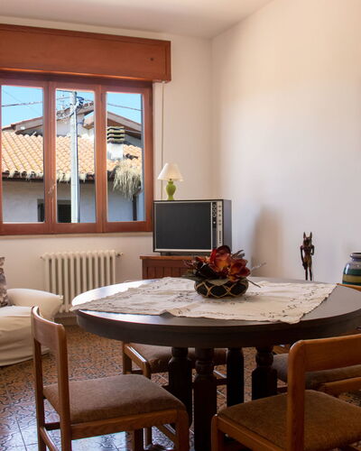Patrizia: Table, Picture Frame, Property, Furniture, Plant, Wood, Window, Interior Design, Architecture, Floor