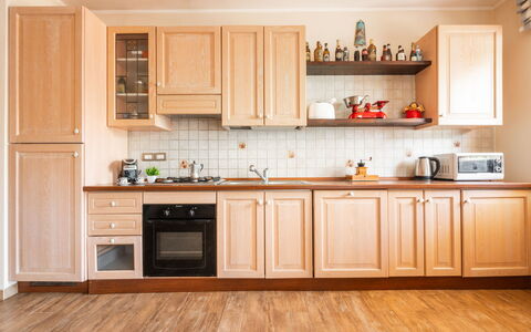 Rifugio a Tisiddu: Brown, Cabinetry, Countertop, Property, Kitchen, Kitchen Stove, Wood, Home Appliance, Kitchen Appliance, Flooring