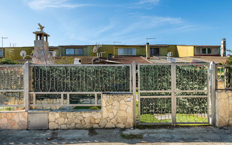 Porru: Building, Daytime, Property, Sky, Water, Plant, Window, Swimming Pool, Tree, Urban Design