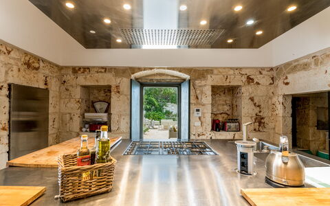Masseria Isaia: Table, Furniture, Plant, Countertop, Houseplant, Interior Design, Wood, Kitchen, Chair, Living Room